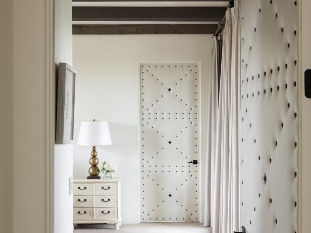 Master Bedroom Exposed Beam Ceiling White Upholstered Doors